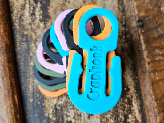 A double sided dog poop bag holder hook for responsible dog parents.