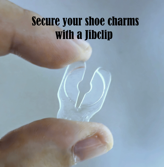 Keep shoe charms in place with a Jibclip! Buy a 5, 10, or 20 pack of Jibclips. Compatible with Jibbitz.